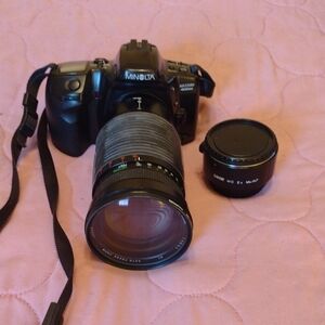 Black SLR Camera with Lens